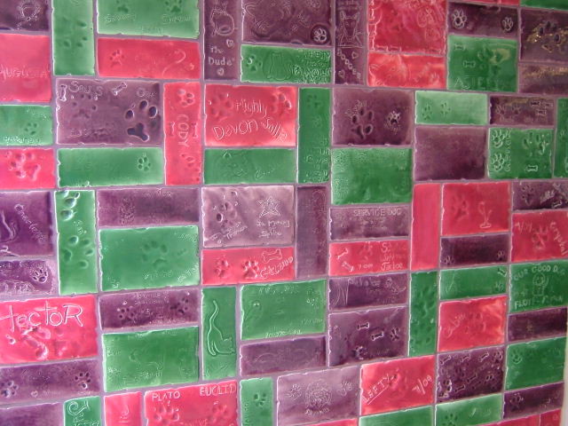 As you enter our building, you'll see a beautiful collection of tiles decorated by some of our clients.